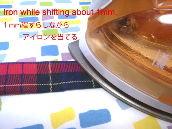 Ironing belt cloth with a 1 mm front shift except extension part