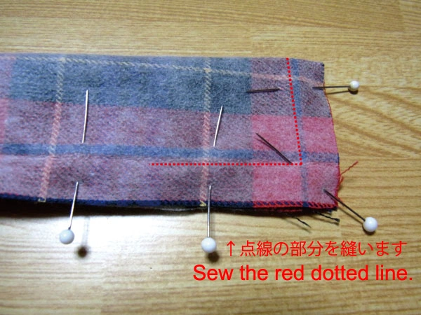 Sewing left back belt cloth along red dotted line matching corners