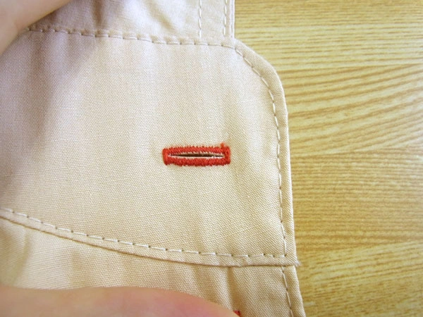 Cutting open buttonholes safely