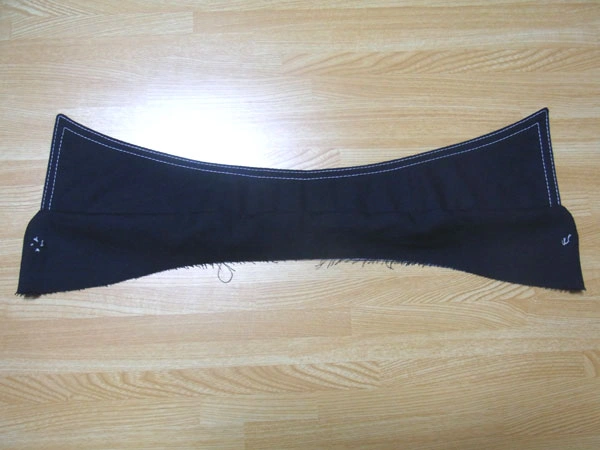 Seam allowance trimmed for collar stand curve