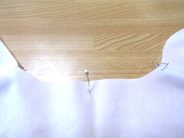 Ironing the collar stand for a neat finish