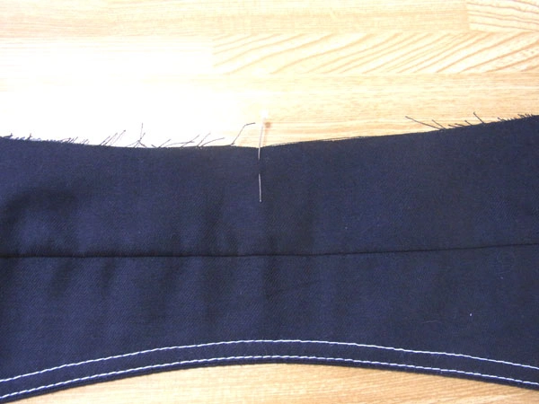 Collar stand pressed into shape