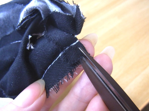 Ironing collar stand to hide seam line