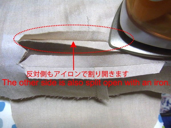 Pressing seam allowances open with iron