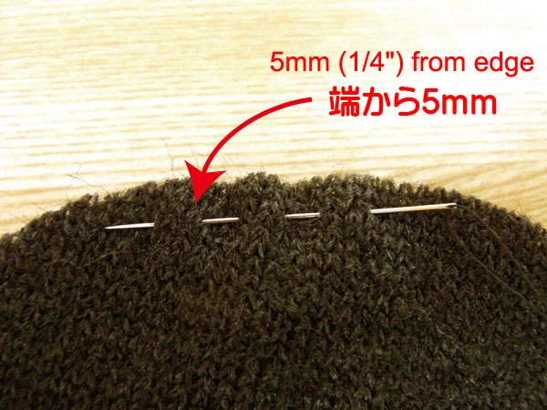 Close-up of running stitch about 5mm from the fabric edge