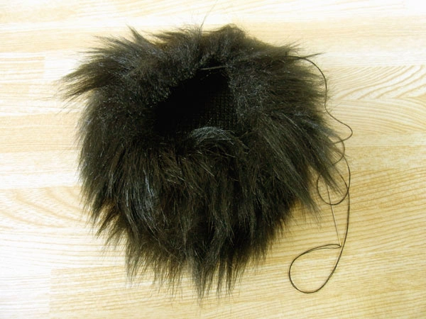 Gathered fur fabric forming a fluffy round shape