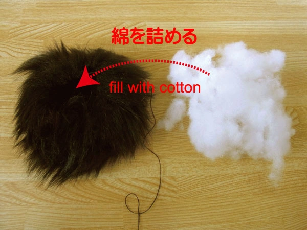 Stuffing the furry bulb with cotton