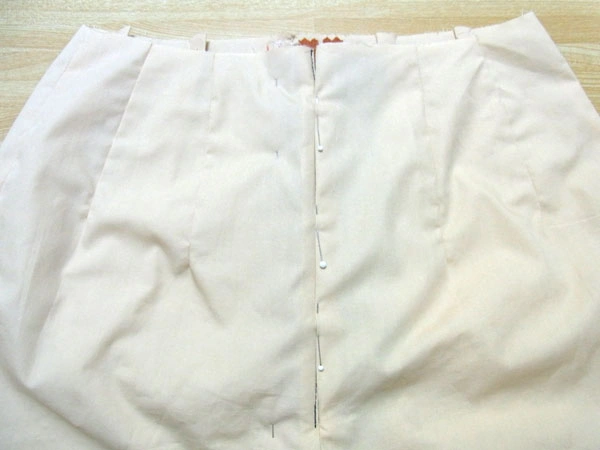 Pin facing from front to prevent spreading