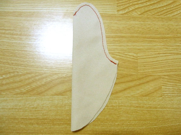 Sewing the thumb piece of a glove