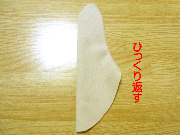 Turning the sewn glove thumb piece right side out