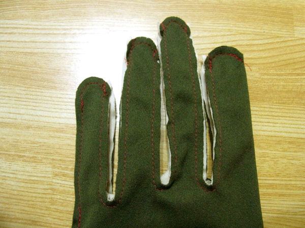 Turning the glove right side out after sewing fingers