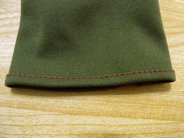 Sewing glove hem with triple fold