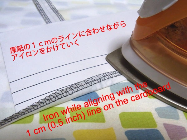 Hem overlock sewing process step
