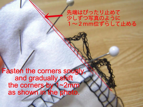 Pinning facing to blouse hem corners