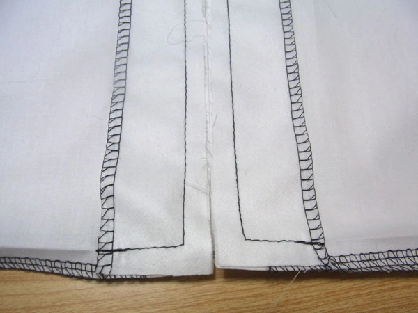 Facing stitched to blouse hem