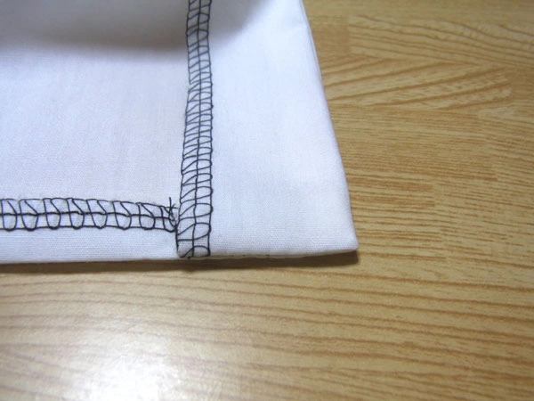 Hem corners hidden inside seam allowance