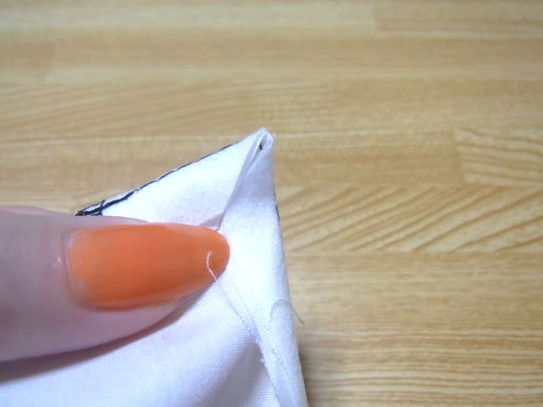 Hem allowance corners cut diagonally