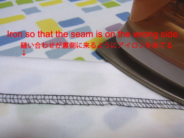 Pressing blouse facing from inside with iron