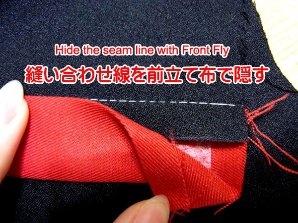 Ironing the front fly fabric after making the incision