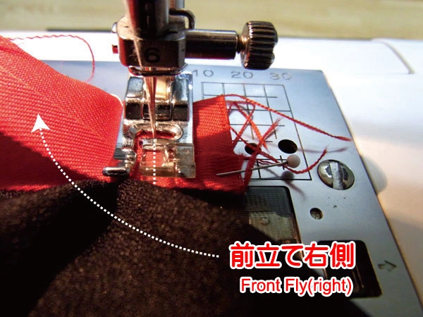 Turned over front fly showing 5 mm extension