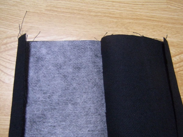 Using cardboard tool for ironing cuffs