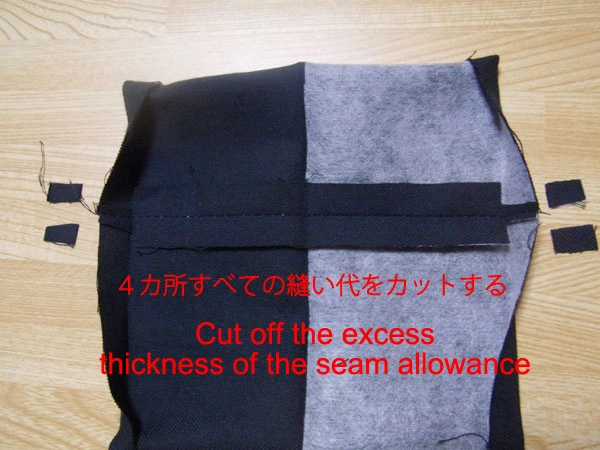Carefully trimming seam allowance on cuff