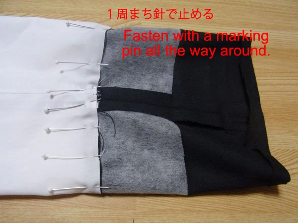 Sleeve pinned at notch marks