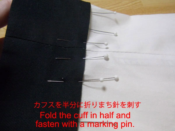 Folding cuff upward to attach to sleeve
