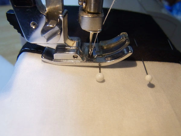 Pinning folded cuff to sleeve