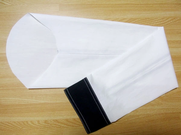 Close-up of neat sleeve cuff finish