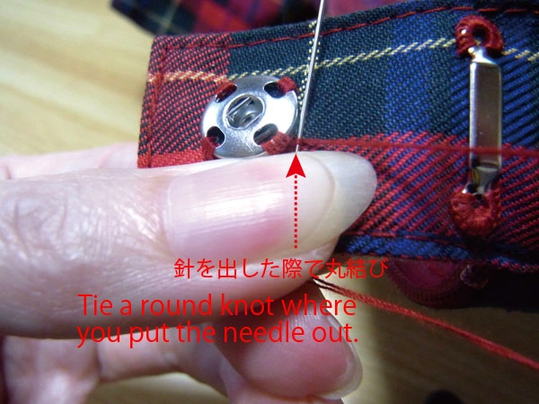 Tying knot near female snap fitting