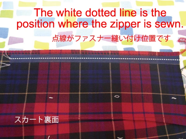 Stay tape attached on both sides of zipper sewing position